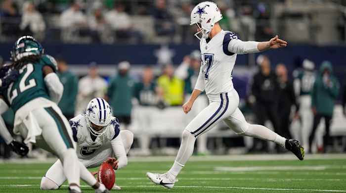Dallas Cowboys place kicker Brandon Aubrey (17), with Bryan Anger holding, kicks a field goal against the Philadelphia Eagles during the first half of an NFL football game, Sunday, Dec. 10, 2023, in Arlington, Texas. (AP Photo/Sam Hodde)